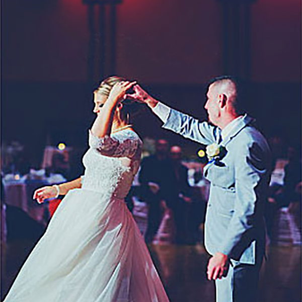bride and groom dancing
