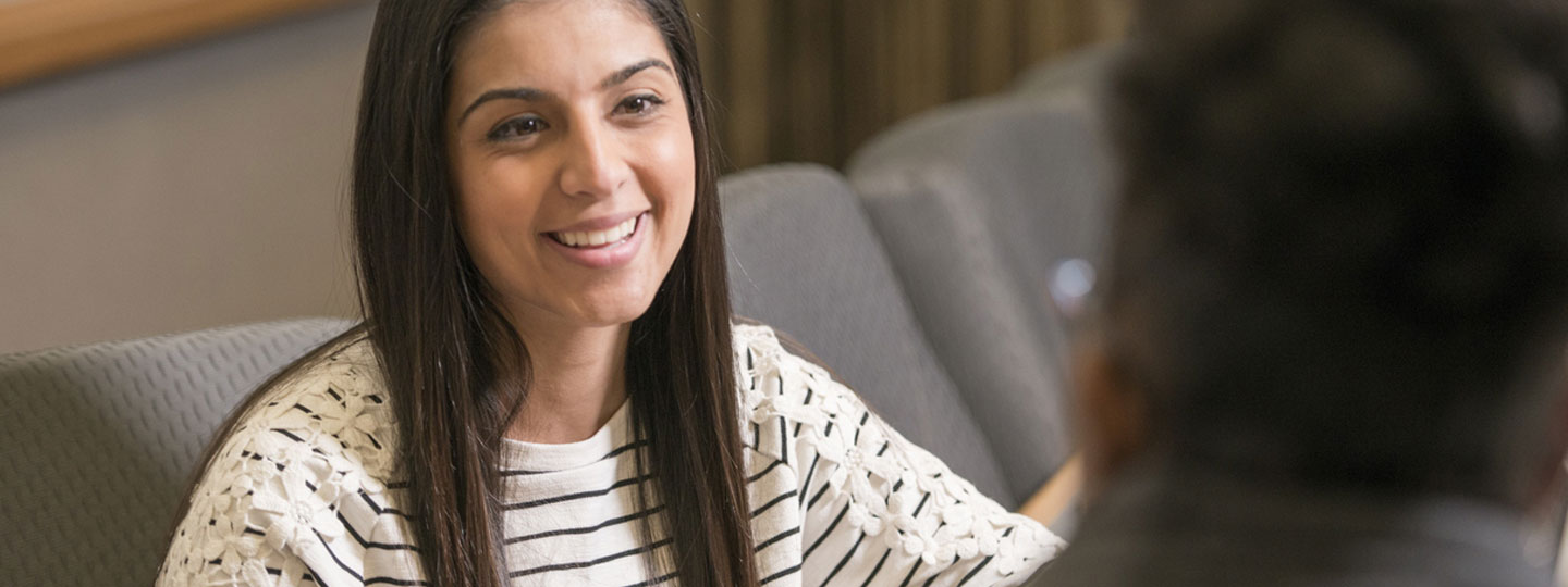 Meeting attendee smiling